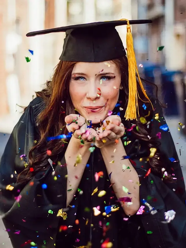 Graduates in caps and gowns at a university commencement