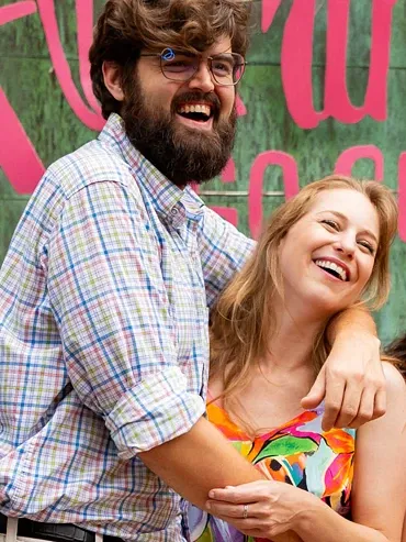 Couple posing for a photo booth