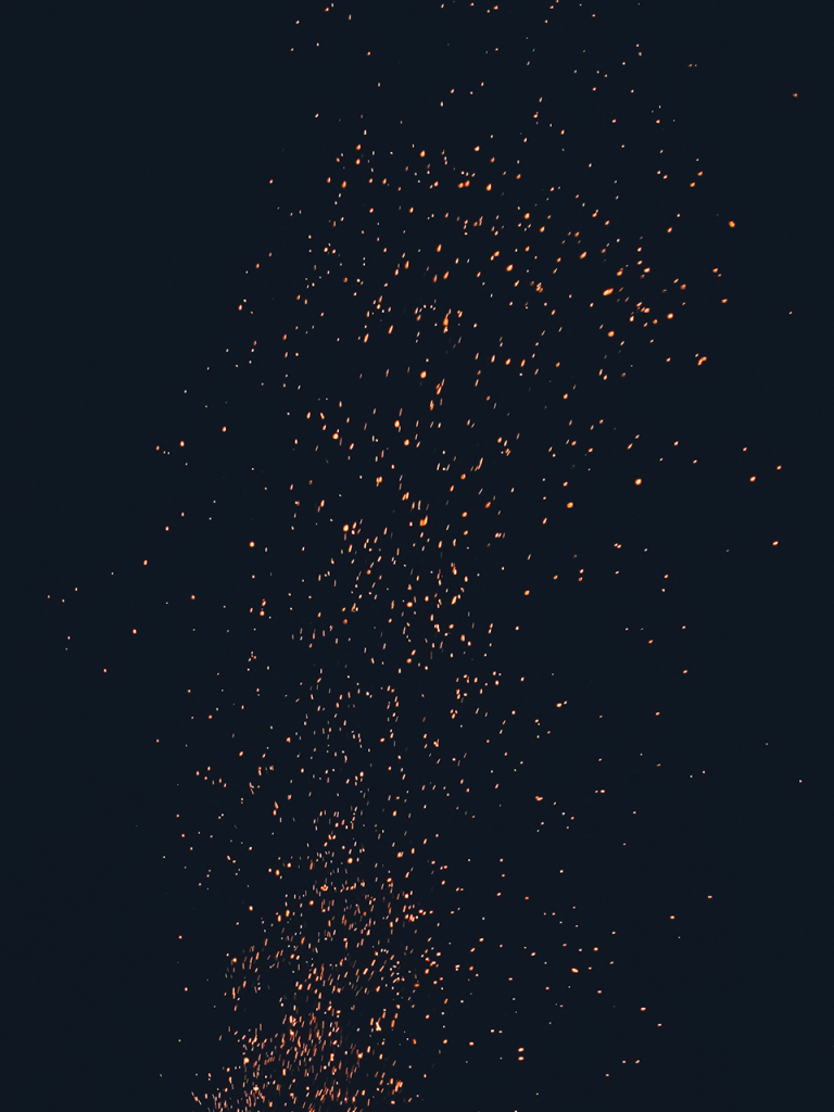 Embers flying through black sky halloween photo booth backdrop