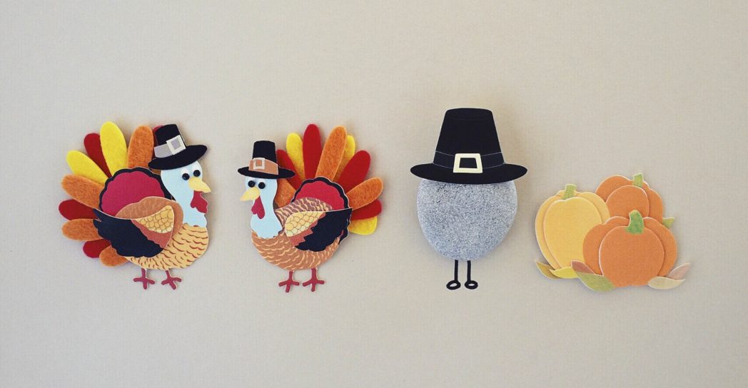 two felt turkeys and a rock