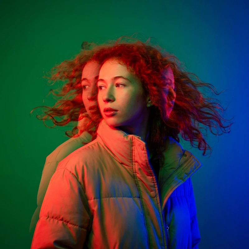 Multi-exposure portrait in red, green, and blue light AI effect